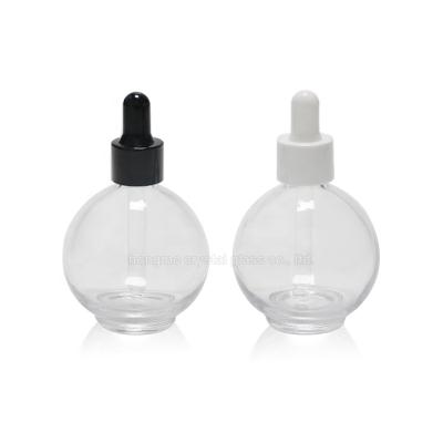 China Recyclable Material Empty Ball Shape Round 70ml 75ml Clear Essential Oil Glass Cosmetic Bottles With White Rubber Dropper Cap Top For Cuticle Oil for sale