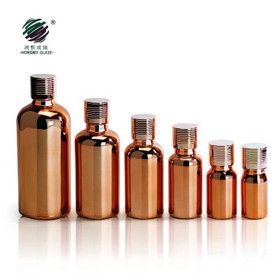 China Recyclable Material 5ml 10ml 15ml 20ml 30ml 50ml 100ml Plated Custom Mounted Gold Glass Bottle For Essential Oil With Euro Aluminum Dropper Cap for sale