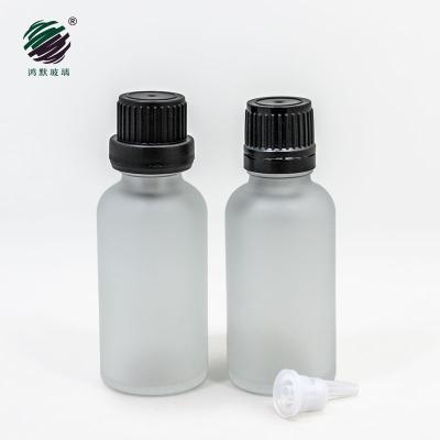 China Personal Care 1oz Frosted Glass Dropper Bottle 30ml With Black Plastic Screw Caps for sale