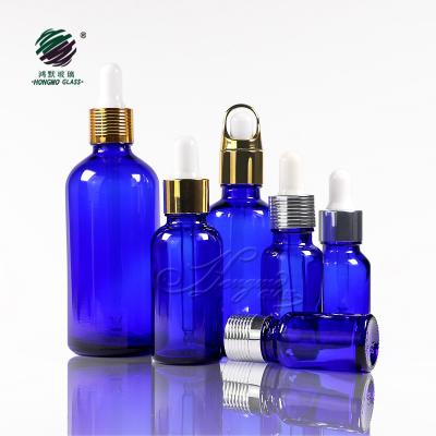 China Glass Dropper Recyclable Material Essential Oil Bottles Serum 50ml Blue Glass Bottle With Dropper for sale