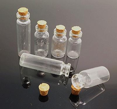 China Personal Care 2ML 3ML 5ML 10ML Small Vial Glass Bottle With Cork Lid for sale