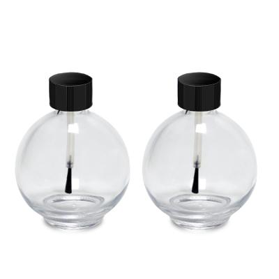 China 75ML Recyclable Material Round Clear Glass Nail Polish Remover Bottle Black Ball Cap With Brush for sale