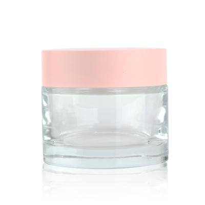 China Round Cosmetic Cream Empty Glass Jar 30g 80g Cosmetic Jar With Pink Lids For Lotions, Powder, Ointment for sale