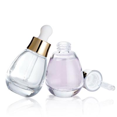 China Skin Care Cosmetic Clear Essential Oil Bottle 30ml Small Bulb-Shaped Dropper Bottle Thick-Based for sale