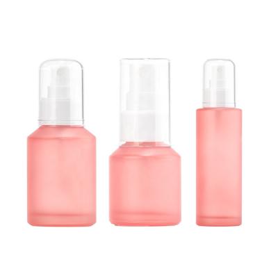 China New Cosmetic Pink Frosted Glass Empty Cosmetic Spray Bottle 100ml Spray Bottle 15ml 30ml 60ml Spray Bottle for sale