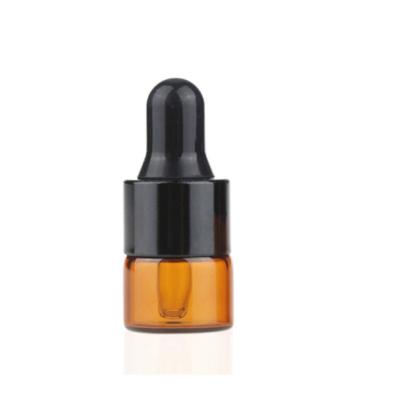 China Amber Glass Vials Bottles 1ml 2ml Travel Sample Bottle Essential Oils Cosmetic Bottles With Orifice Reducers, Dropper, Trackball for sale