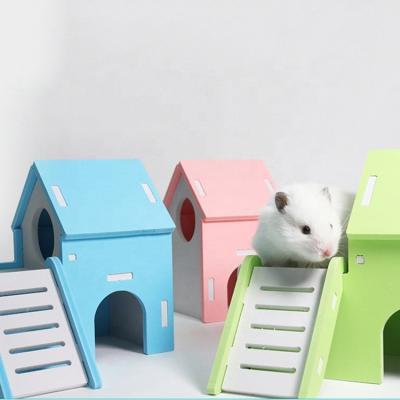 China Viable Color Round Slide Wooden Nest Sleeping Hamster House for sale