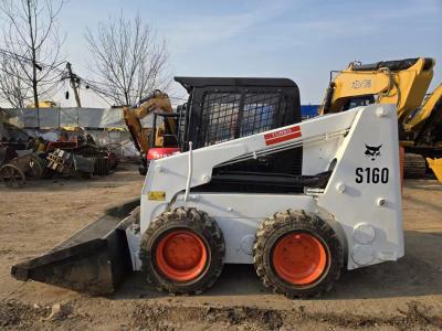 China Gebrauchtes 100% Original Bobcat S160 Steerloader mit 0,4m3 Eimer zu verkaufen