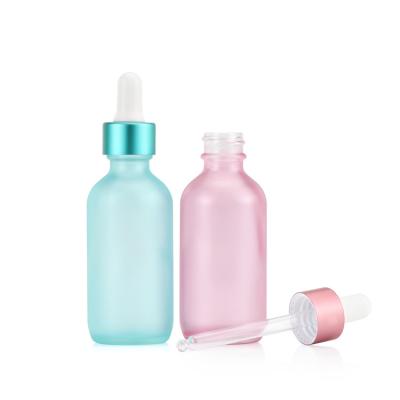 China Hot Sale Personal Care Products Fancy 0.5 1 2 4 8 16 32 fl oz Boston Empty Blue Pink Round Frosted Matte Glass Dropper Bottle For Cosmetic for sale