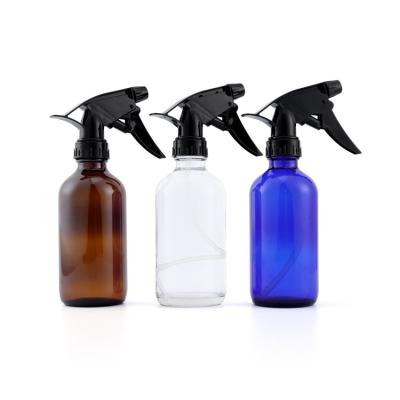 China Personal Care Custom Logo 0.5 1 2 4 8 16 oz Empty Flat Round Cobalt Blue Garden Cleaning Water Glass Spray Bottle With Spray Pump for sale