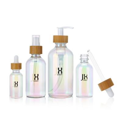 China 30 60 120 250ml Cosmetic Holographic Glass Dropper Bottles , Essential Oil Bottles With Bamboo Lids for sale