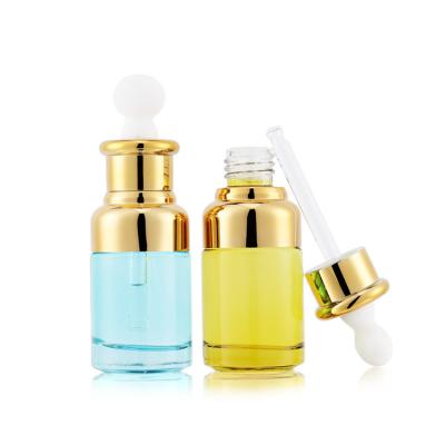 China Vintage 20ml 40ml 1oz 1.7oz Personal Care Shoulder Metallic Gold Special Serum Liquid Glass Bottle With Rubber Dropper Head for sale