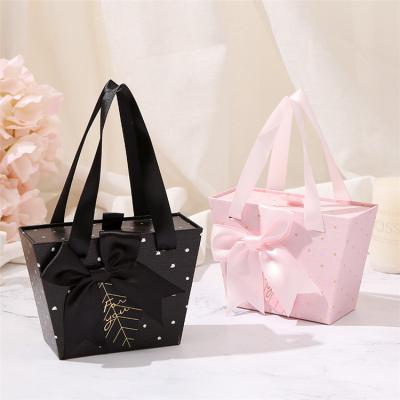 China Handmade Women Paper Shopping Gift Bag Hot Selling Packaging Bag With Ribbon For Jewelry Shopping Gift for sale