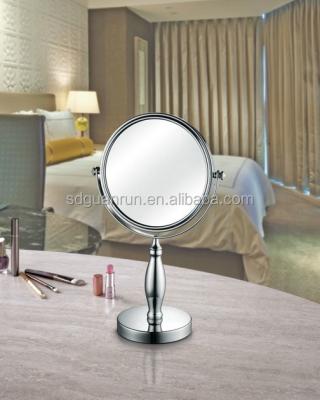 China Double Side Rotatable Magnifying Makeup Makeup Standing Mirror for sale