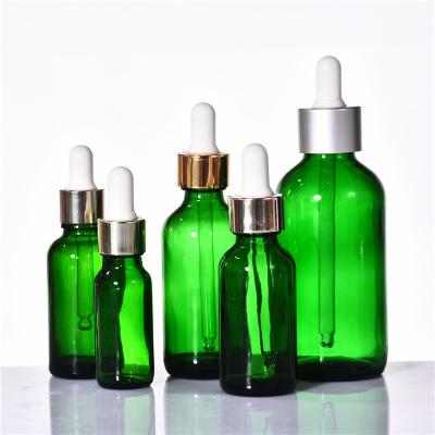 China Quality Guarantee 5ml~100ml Green 10ml Skin Care Essence Bottle 30ml Serum Glass Bottle Cosmetic Essence Dropper Bottle for sale