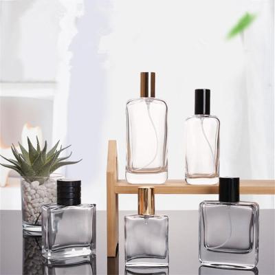 China Top Selling Luxury Transparent Square Cosmetic 50ml Empty 100ml Perfume Glass Bottle for sale