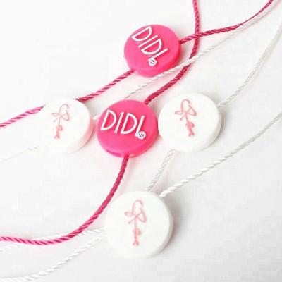 China Hang Tag String Factory Custom Name Logo Plastic Hangtag Seal String Fastener for Garment Accessory for sale