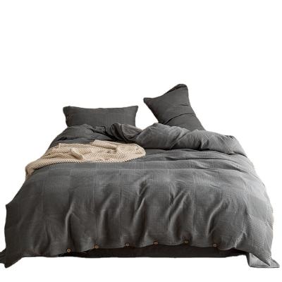 China New Sustainable Jacquard Washed Cotton Button Four-Piece Comforter Cover Sheet Set for sale