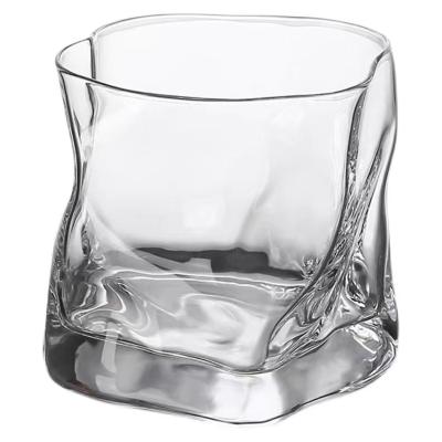 China Beautiful and durable handmade glass whiskey thickened whiskey crystal bottom creative corrugated glass for sale