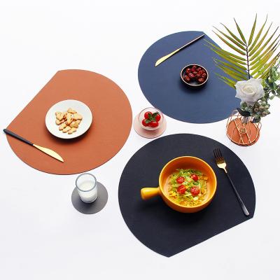 China Sustainable Wholesale Environmentally Pu Leather Anti-slip Luxury Western Placemat for dinning table for sale