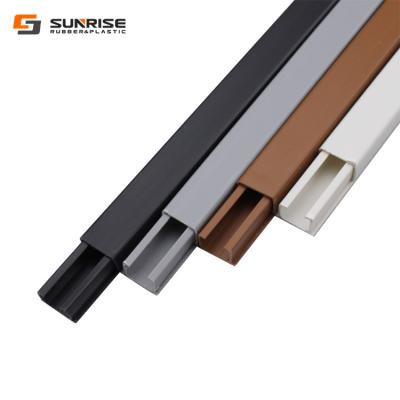 China Good quality sticker pvc plastic fire retardant pvc adhesive arc floor cable trunking duct Te koop