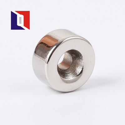 China Industrial Custom Strong Neodymium Countersunk Round Magnet With Screw Hole zu verkaufen