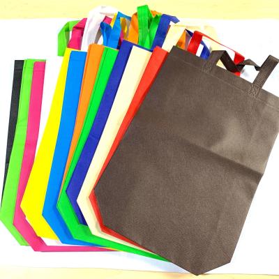 China High quality eco-friendly and heavy duty reusable pp spunbond fabric sack bag non woven shopping bag for sale