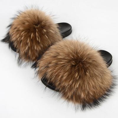 China 2021 lightweight wholesale raccoon fur slips shoes women smudge slipper luxury fur slippers for sale