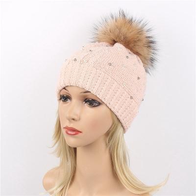 China breathable & Women's Waterproof Hat Winter Knit Beanie Raccoon Fur Pom Ball 18cm Ski Cap Bobble Hat Real Straight Needle Knit Hat Pattern for sale