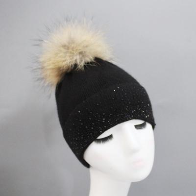 China breathable & Warm Women Raccoon Fur Pompom Waterproof Hat Knit Skull Cashmere Slouchy Beanies For Women for sale