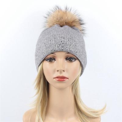 China breathable & Wholesale Waterproof Faux Fur Detachable Fur Beanie Custom Cashmere Knit Beanie Pom Pom Thick Warm Winter Hats For Women for sale