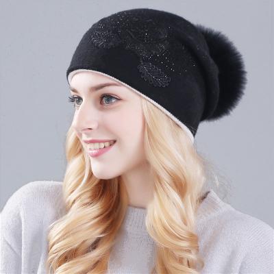 China Big Warm Dobby Fur Pom Pom Hat Winter Knit Hats Fashion Angora Knitted Beanie Hat With Raccoon Fur Pompom for sale