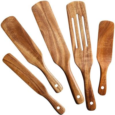 China Hot Selling Viable 5pcs Amazon Natural Teak Kitchen Utensils Spatulas Wooden Spoons Set High Quality Wooden Spurtles Set For Cooking for sale