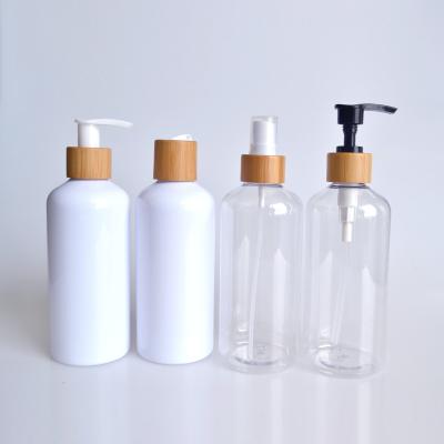 China 50ml 100ml 250ml 300ml 500ml clear pet white plastic spray pump bottle with nozzle Bamboo wooden lid for sale