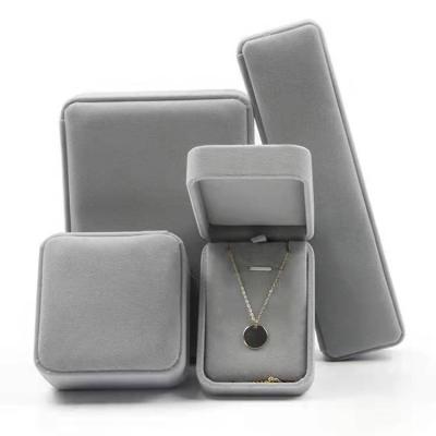 China Fashionable Luxury High Quality Velvet Cloth Ring Package Gift Custom Jewelry Box for sale