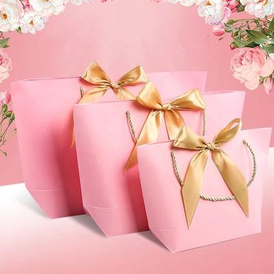 China 10pcs/lot daily wedding birthday party gift bag wrapping paper candy box with gold handle for sale