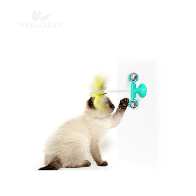 China Hot Sale TPR Pet Catnip Viable Toy With Suction Cup Toy Cat Rotary Ball Feather Wand Scratcher Temptress for sale