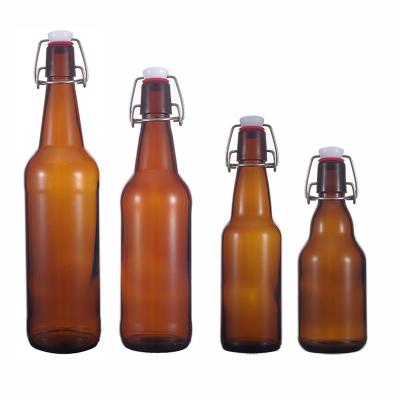 China Household Products Brown Beer Bottle With Lid Buckle Beverage Glass Bottle Snap Lock Bottle for sale