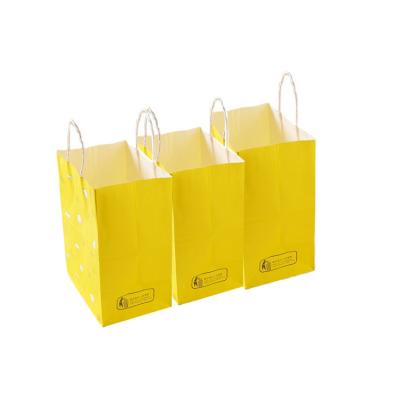 China Recycled Materials Wholesale Disposable Paper Bags With Your Own Logo for sale