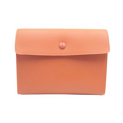 China Fashion High Quality Leather Cosmetic Bag Clutch Waterproof PU Makeup Bag Orange Portable Organizer for sale