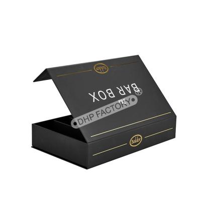 China Luxury Black Magnetic Closure Gift Box For Condiment With Paper Divide for sale