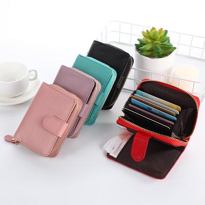 China Waterproof High Quality Fashionable Lychee Women Leather Purses Pocket Card Holder Minimalist Wallets for sale