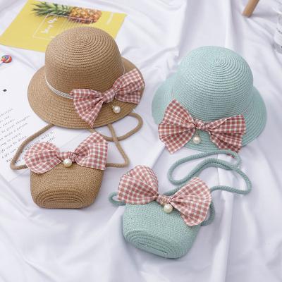 China Straw Summer Sunshade Hat Handbags high quality kids places girls travel wild beach accessories bow cross - body bag for sale