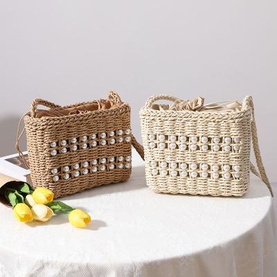 China New Straw Bag Popular Woven Pearl Fashion Trendy Beach Bag Handmade Cross - Body Bag for sale