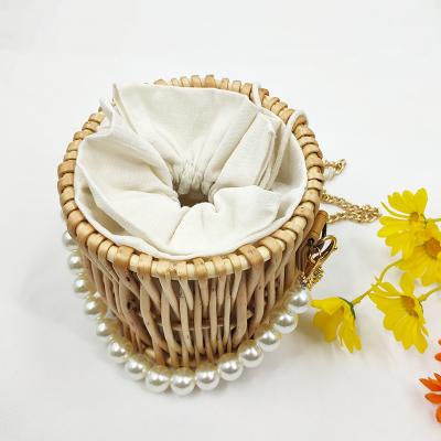 China Fashion Summer Rattan Bags Fashion Straw Woven Handbags Pearl Bags Small Women Bucket Handbags for sale