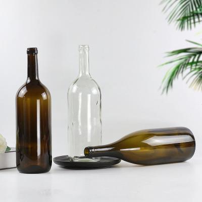 China Customized Antique Food Grade Logo 1500ml Green Color Cork Glass Wine Bottles for sale