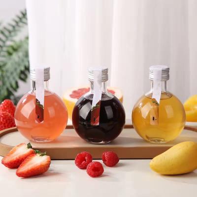 China Wholesale 180ml Clear Round Mini Juice Bottle Beverage Wine Drinking Glass Water Bottle for sale