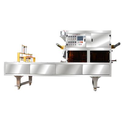 China Multifunctional Food Stainless Steel Water Filling Machine Vacuum Fast Food Tray Soluble Packaging Machine For Can for sale