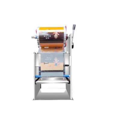 China Food Stainless Steel Automatic Sealing Machine Automatic Packing Sealing Machine for sale