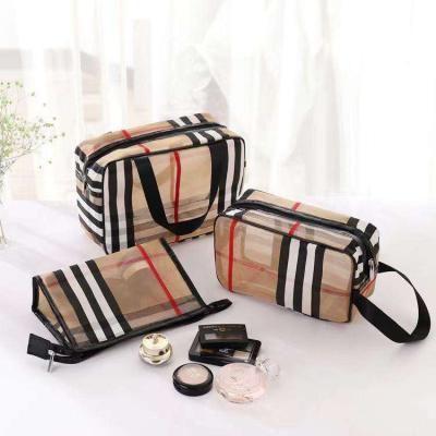 China Friendly Material 3pcs/Set Cosmetic Bag Vintage Designer PVC Mesh Stripe Waterproof Travel Bags Multifunctional Transparent Makeup Storage Bag for sale